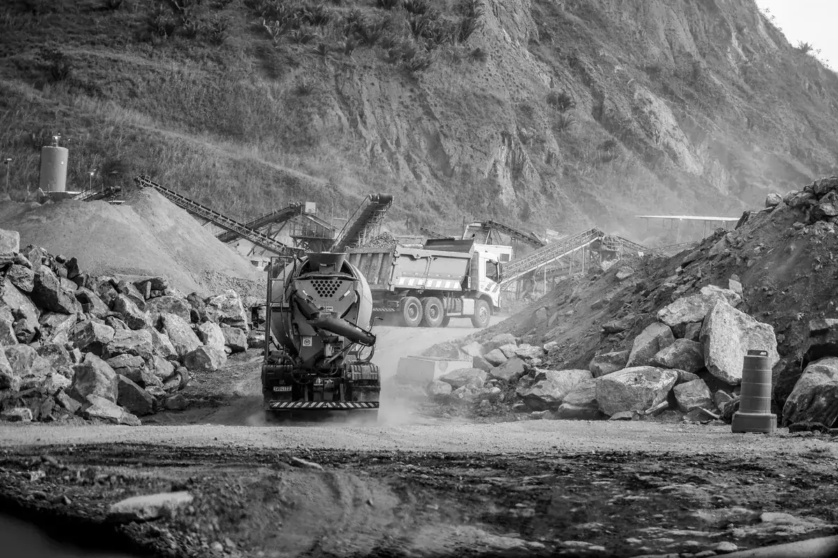 A concrete mixer truck parked, illustrating the equipment involved in concrete cost considerations.